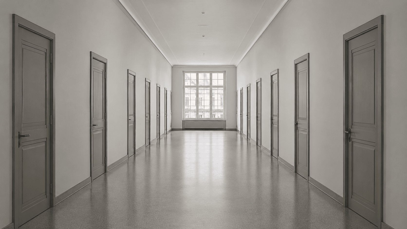 Leerer Behördenflur mit geschlossenen Türen — Einziehung beim Geschäftsführer nach § 73 StGB (BGH 1 StR 502/25)